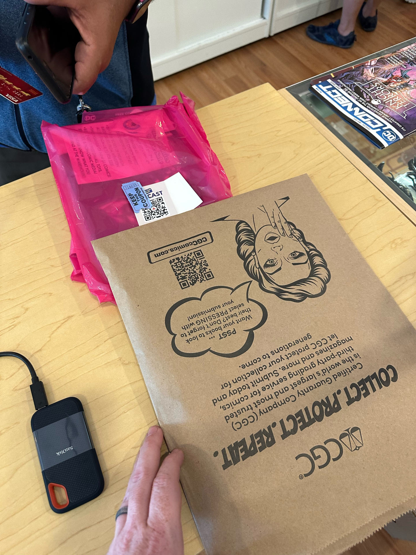 A printed campaign bag from CGC distributed through a comics retail partner